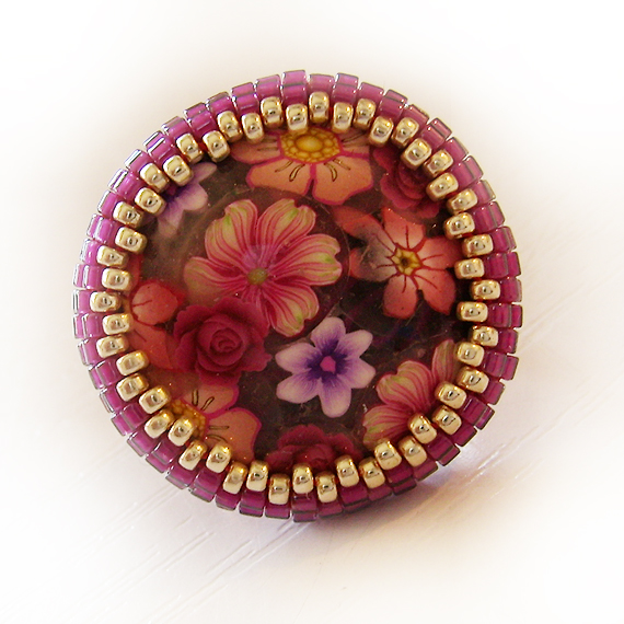 anillo cabuchon flores delica