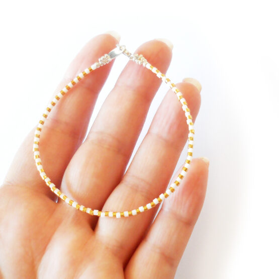 Wishes Bracelet with 24kt Gold and white beads in sterling silver