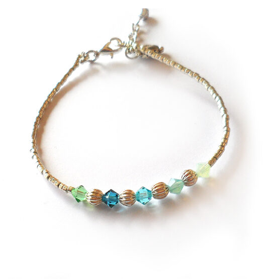 Pulsera Cristalitos Swarovski Natura y bolitas plateadas