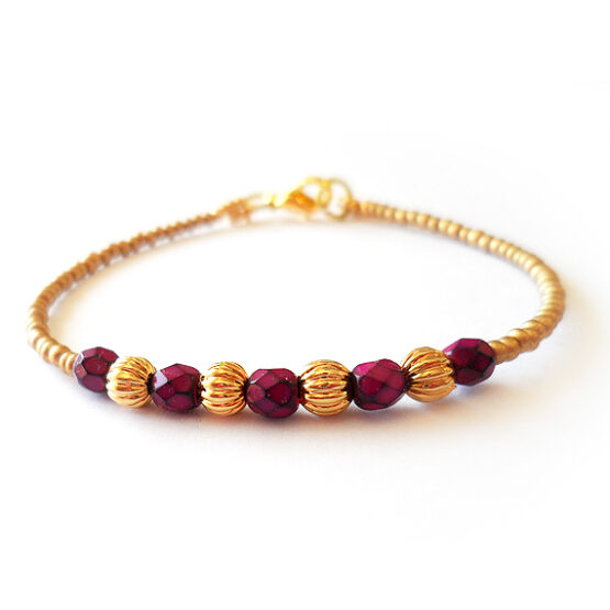 Pulsera Sheyda de Abalorios Dorado y Morado